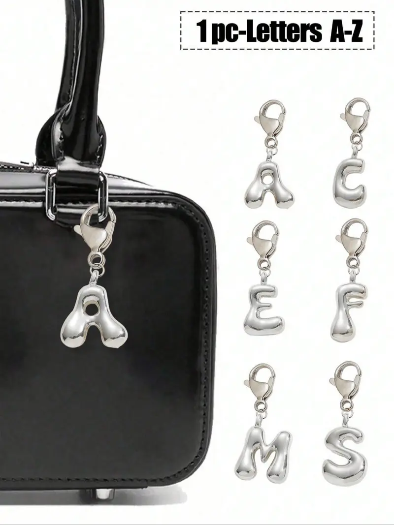 silver alphabet pendant stussy - TikTok Shop