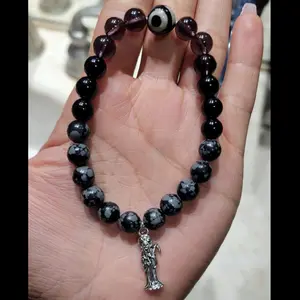Santa Muerte Evil eye beaded charm bracelet
