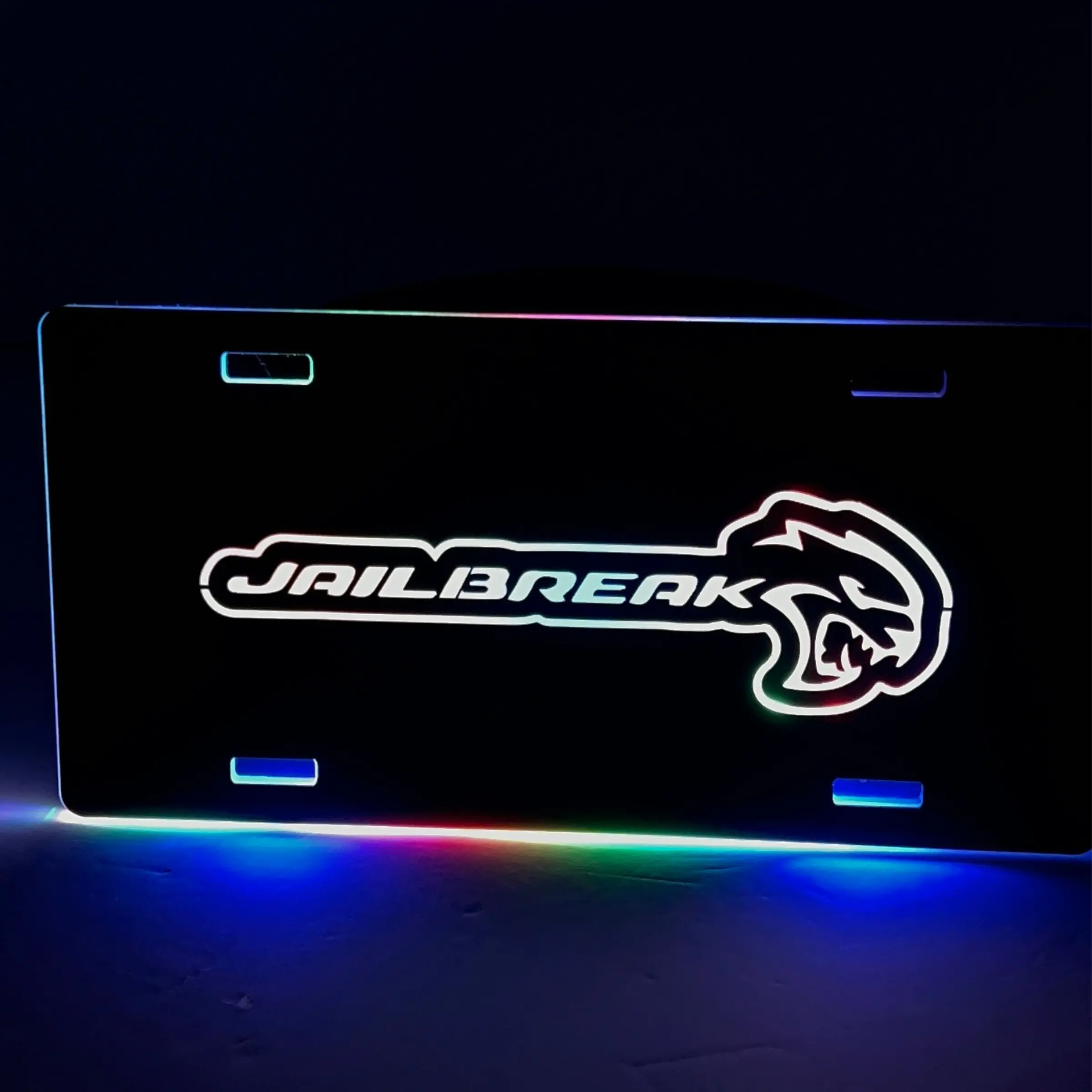 RGB Flow Series "Jailbreak" LED Illuminated License Plate for Cars, Trucks, Motorcycles - 6x12 in Acrylic, Multi-Color, App Controlled, 12”l x 6”w, Includes Wire Harness, 16 Million Colors
