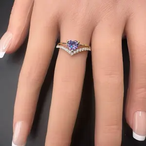 Anillo de Corazon con piedra morada De 14 Kilates