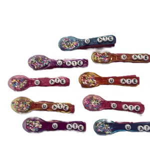 Cheer Spirit "U Ate" Clothespins with Colorful Sprinkles and Letter Design