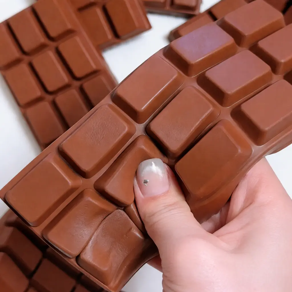 Super Slow Rising & Soft Touch PU Stress Relief Toy – Realistic Chocolate Bar Design, Squishy Squeeze Fidget for Kids, Teens & Adults, a Must-Have for Stress Relief, Fun & Safe Sensory Play.