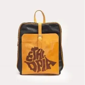 Nedf Design Hagere Bag Ethiopian Heritage Leather Backpack with Embossed Ethiopia Map Laptop Sleeve Multiple Compartments Mustard Yellow Handmade in Addis Ababa