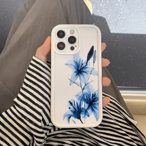 Watercolor blue lily pattern, drop-proof and non-slip TPU full-coverage lens phone case, compatible with iPhone 17, 16, 15, 14, 13, 12, 11, XS, X, Samsung and other models. Makes a great gift for friends or family.