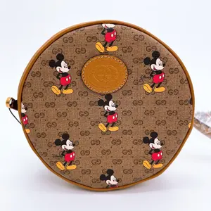 Pre-owned GUCCI canvas Crossbody Bags X DISNEY Mini Vintage GG Supreme Monogram Mickey Mouse Round Crossbody Bag Beige Vintage Sun Oil