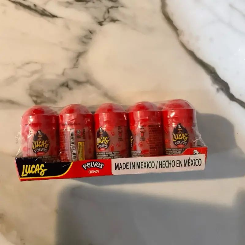 Lucas chamoy Or mango powdered candy Lucas chamoy Or mango powdered candy