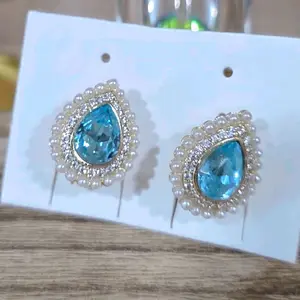 Gold Plated Sky Blue Swarovski Crystal Teardrop Earrings with Pearl Detail
