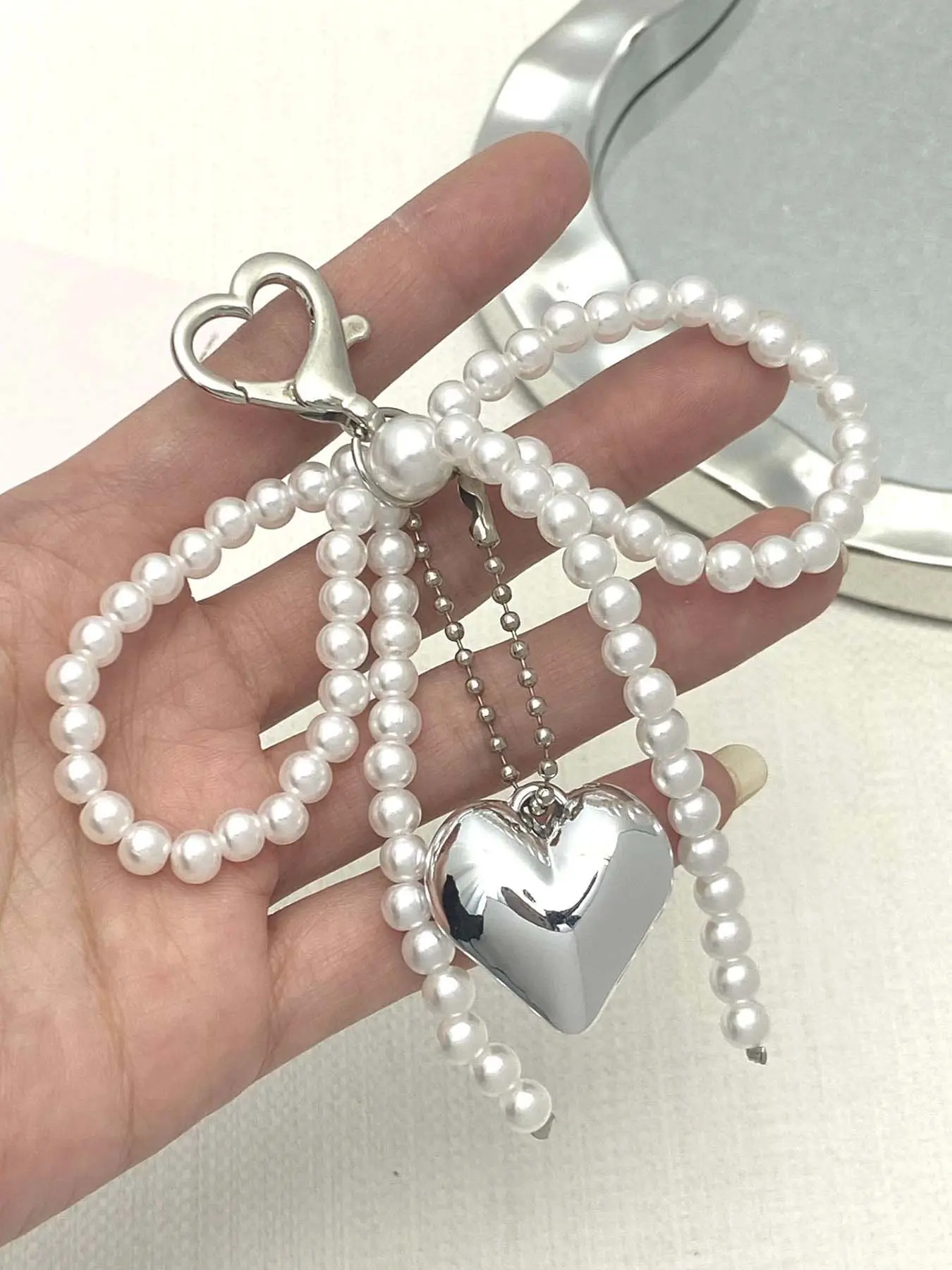 Silver heart-shaped pendant keychain, Valentine's Day gift, backpack handbag charm accessories, small exquisite and elegant decoration, pearl bow heart pendant keychain bag decoration pendant DIY niche personality pendant, Stylish Keychain
