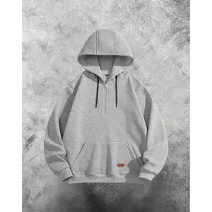 Half-zip hoodie with a fashionable casual style, featuring a classic half-zip design, easy to put on and take off small items, large pockets, and a loose fit—ideal for everyday casual activities. GARMENTARY