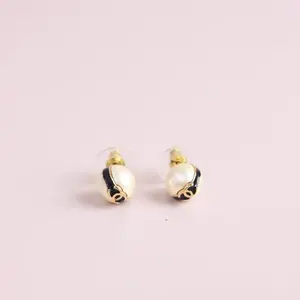Pre-owned Chanel 24S Resin Pearl with Leather CC Logo Band Stud Earrings 0513GIA