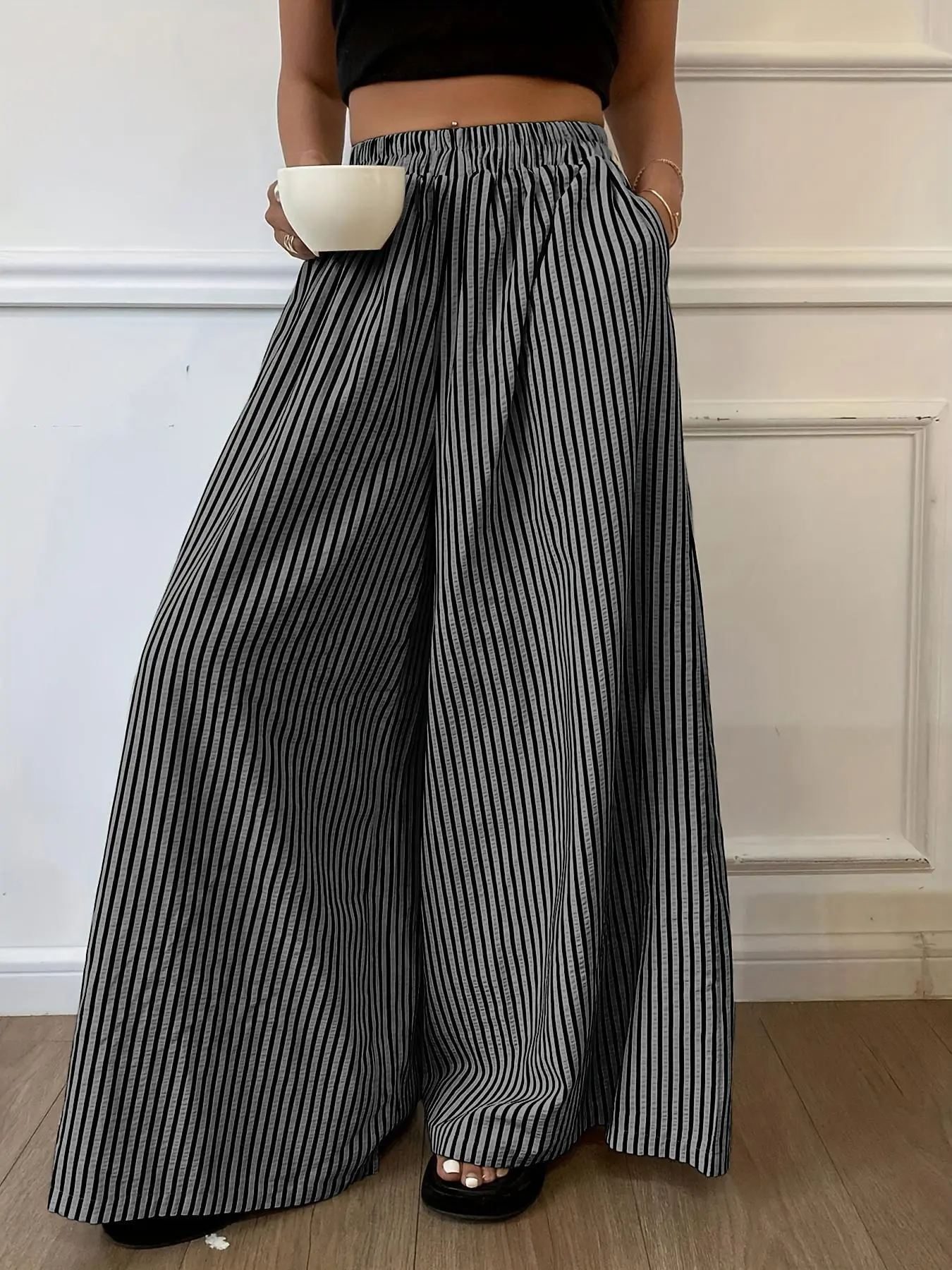 Women’s ruched textured vertical striped wide-leg pants — lightweight, breathable ruched fabric with an elastic waistband; loose fit with contrasting colors; casual long pants available in multiple colors for vacations and versatile styling.