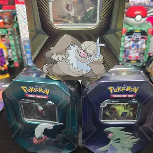 Pokémon Triple Whammy Tin Includes Promo and 3 Booster Packs Collectible Trading Card Game Featuring Tyranitar, Darkrai or Slaking