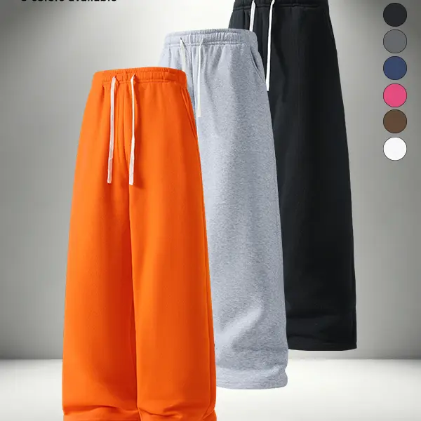 Men’s solid-color wide-leg straight sweatpants with a drawstring waist, loose casual long pants in a street-style design, suitable for year-round wear, featuring pumpkin orange, perfect for creating a Halloween season vibe and effortless pumpkin patch–the