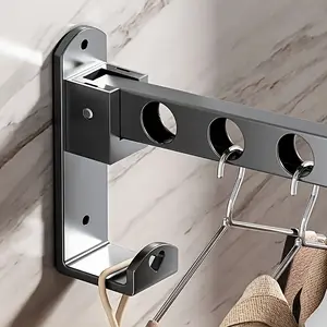 Metal hanger with 6/8 holes| Wall-mounted, foldable, space-saving| Matte Black| Multi-functional drying and storage rack, suitable for laundry areas, bedrooms, and bathrooms| Very suitable for clothing and miscellaneous storage, garment hanger