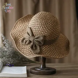 Versatile retro woven handmade straw hat with ruffled bow, elegant French sun hat, foldable, breathable travel beach hat.