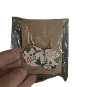 Handmade Leather Earrings with Festive Snowflake and Holly Design Perfect for Christmas Gifts