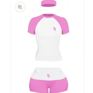 Lounge Set in Pink and White - Includes Top, Shorts, and Accessory - Product Description Not Provided Loungewear