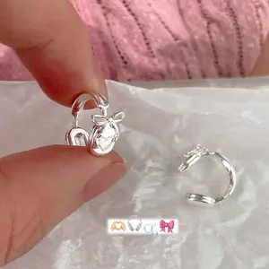 Women's Non-Piercing Bow Earcuff - Hypoallergenic Stainless Steel, Earphone-Inspired Jewelry with Secure Bone Clip Fit, Fashionable Daily Accessory Gift
