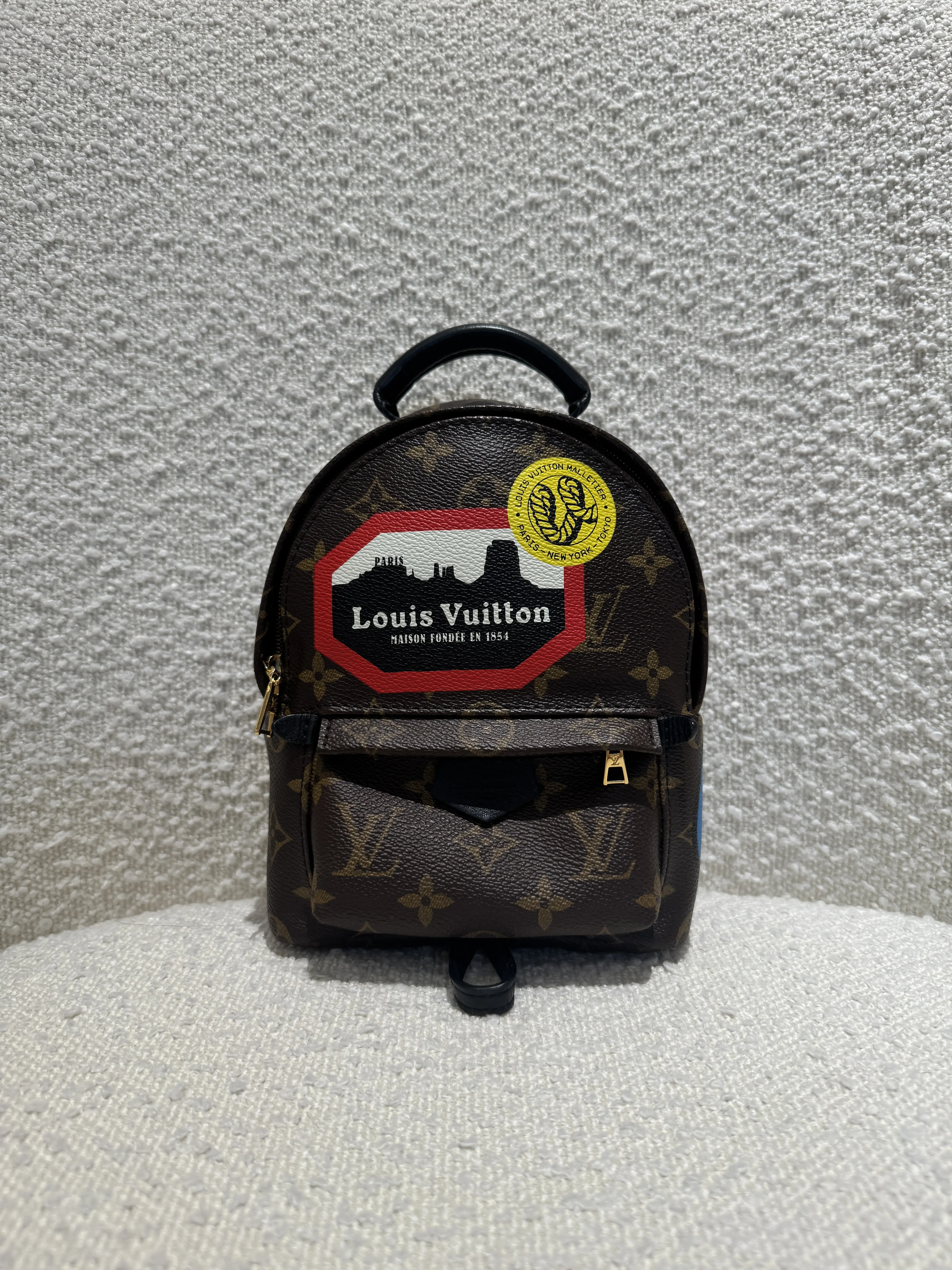 Pre-owned Louis Vuitton palm springs mini world tour monogram canvas gold hardware backpack