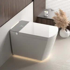 Modern Integrated Smart Toilet Auto Open Close Lid Temperature Heating Seat Instant Warm Water Cleaning Automatic Flush Remote Control Foot Sensing Flush High End Intelligent Toilet with Soft Ambient Light