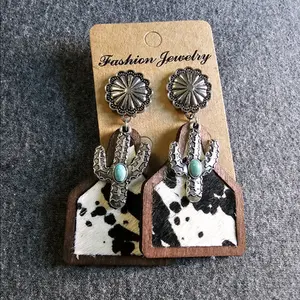 Post back Western style cow print furr earrings
