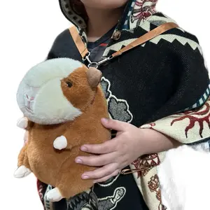 Gordi el cuy - ginnea pig, fashion accessory, boy, girl, Ecuador, tradition, cuy bag, stuffed animal, fluffy,