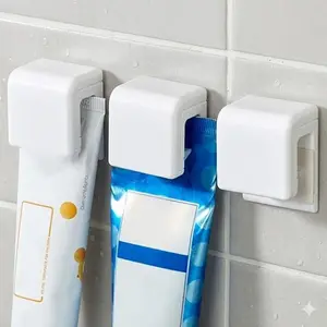 No-Drill Toothpaste Holder Wall Mount, Strong Adhesive Bathroom Organizer, Waterproof Adjustable Clamp for Tubes & Bottles, Space-Saving Storage Solution for All Sizes