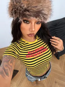 Yellow & Black Stripe "Alluring Enchanting" Printed Cropped Baby Tee, Y2K Retro & Casual Vibe, Streetwear, short-sleeve tee with red "ALLURING ENCHANTING LOVE ME MORE" graphic print