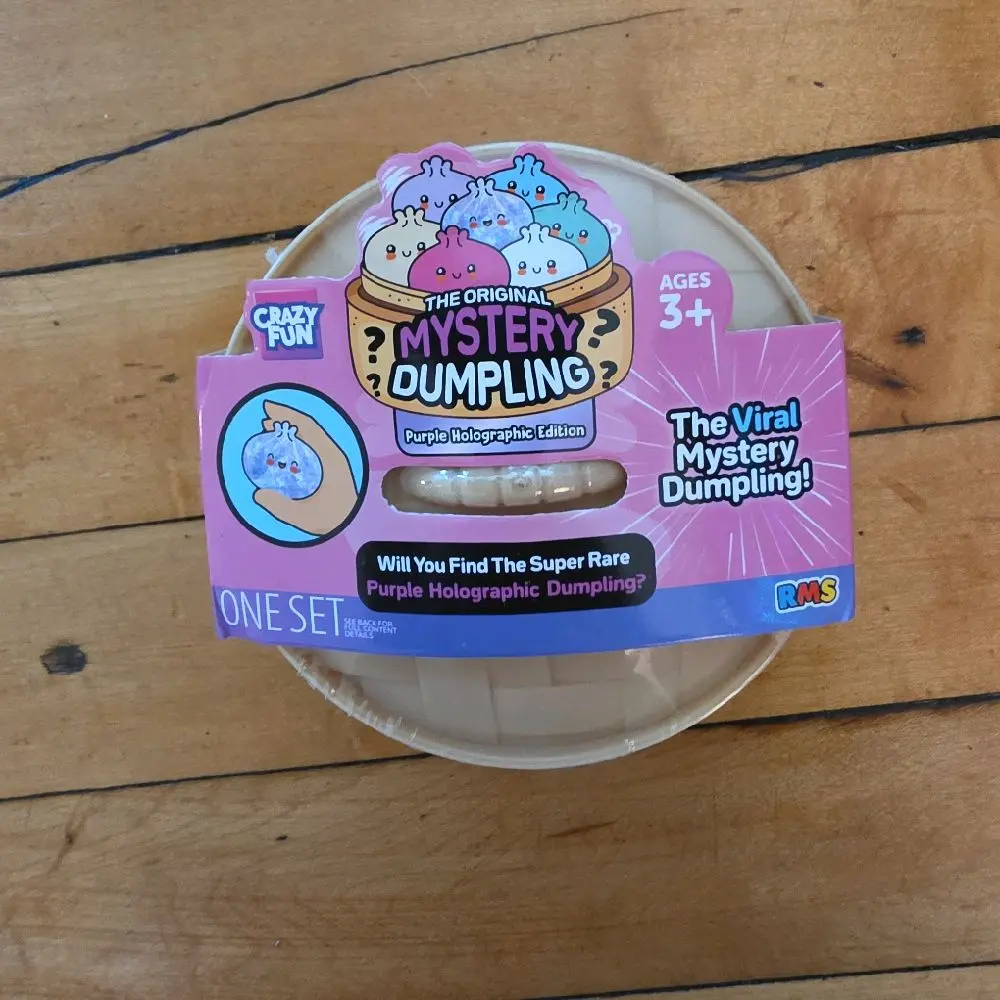 purple holographic dumpling squishy