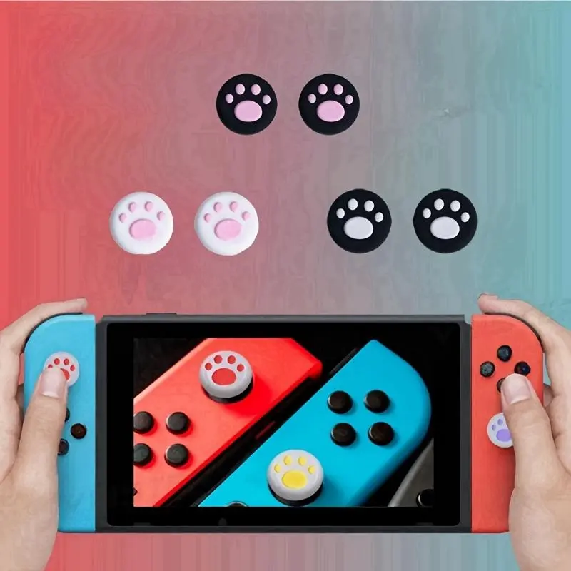 16-piece silicone controller thumb grip cover for Nintendo Switch - Paw print design, white and pink, black and pink, and black and white enhanced grip covers, gaming experience, controller enhancement | vibrant controller cover | silicone grip cover