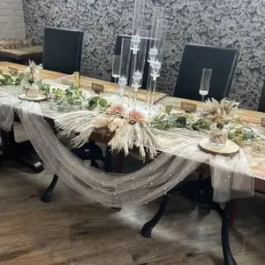 This 2-piece set features romantic white pearl tulle, Overlay table cover, perfect for decorating wedding ceremony venues, including dessert tables, arches, and table runners. Ideal for spring outdoor weddings and Valentine's Day