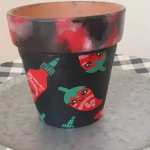 Hot sriracha pepper terracotta pot