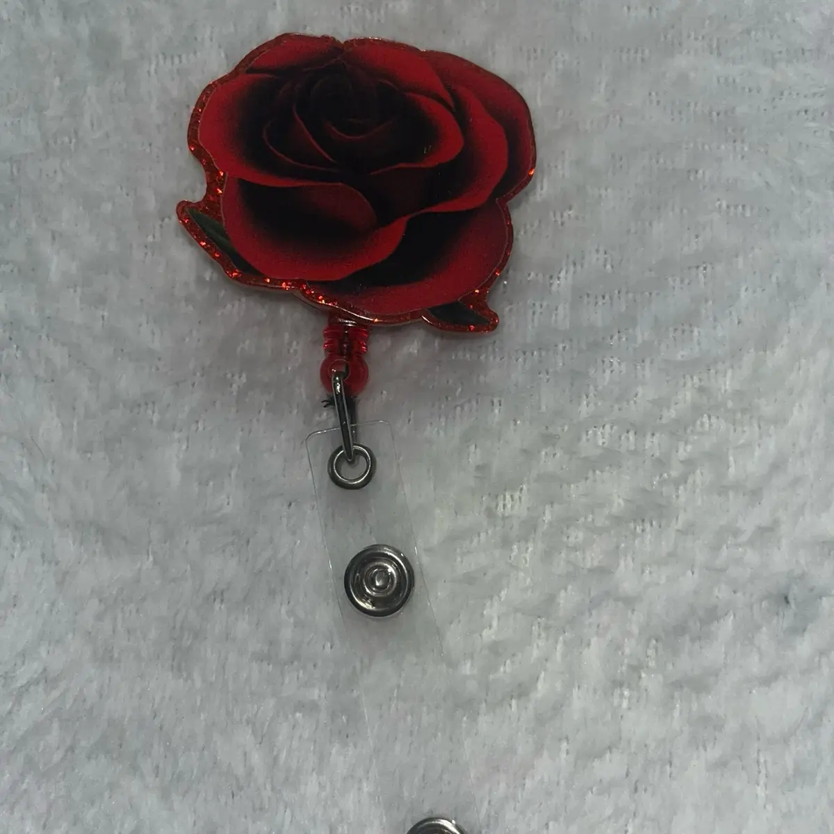 Customizable retractable badge reel ID tags