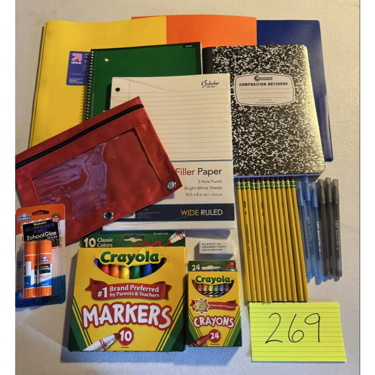 Scholar #269 School Supplies Set - 3 Folders, 1 Notebook, 1 Composition Notebook, 1 Wide Ruled Paper, 1 Pencil Pouch, 2 Glue Sticks, 10 Markers, 24 Crayons, 1 Eraser, 12 Pencils, 3 Black Pens, 3 Blue Pens