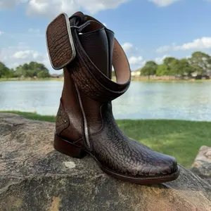 CUELLO DE TORO - Brown Leather Boots with Zipper Closure and Embossed Sole Design