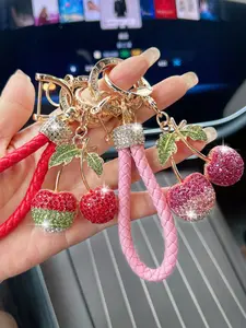 Creative alloy fruit color-blocking small cherry car keychain new package decoration pendant