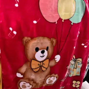 Red Teddy Bear Blanket with Balloons and Musical Notes Design for Comfortable Use