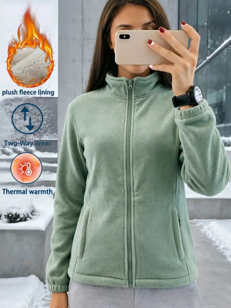 Women’s fleece-lined short zip-up jacket with a stand collar and fluffy interior—casual, warm outerwear for autumn and winter.