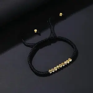 Black Braided Bracelet with Gold-Colored Stainless Steel Accents for Stylish Everyday Wear Elegant and Durable Design