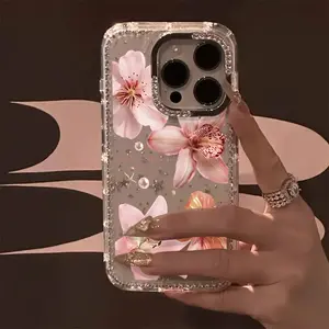 A unique and luxurious rhinestone lily pattern phone case with a transparent, shimmering starlight design.Suitable for iPhone 17 Pro Max/17 Air/iPhone Air/16 Pro Max/15 Plus/14/13/12.Perfect for Christmas and Halloween gifts.