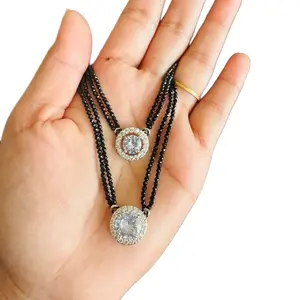 Two layer short beads with stone pendant.