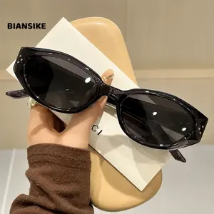 BIANSIKE Cat Eye Sunglasses for Women, Retro Oval Fashion Shades, UV Protection Trendy Eyewear, Black Cream Clear Frame Glasse