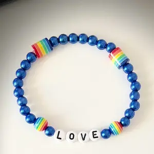 Love pride blue bracelet movement - Kamala election - democracy - lgbt- woman’s choice