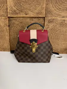 Pre-owned Louis Vuitton LV Hybrid Backpack in Classic Damier Ebene Featuring Vibrant Red & Cream Leather Accents, Polished Gold Tone S lock & Versatile Convertible Strap