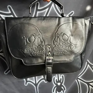 Embossed Twin Skull Satchel