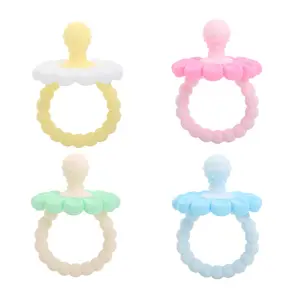 4-Pack Silicone Baby Teethers: BPA-free teething toys featuring multiple textures, specially designed for babies aged 0–36 months. Easy to clean and convenient for little hands to hold and chew.