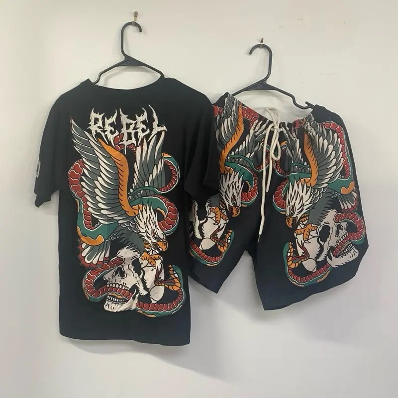 Rebel Brand Black Apparel Set with Colorful Eagle and Skull Design on T-Shirt and Shorts