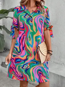 A vintage psychedelic-style polo collar, half-placket, mid-sleeve dress with bow cuffs and a loose, short fit. It belongs to the retro casual style and is suitable for daily outings, vintage-themed outfits, and similar occasions. Casual Classy Dress
