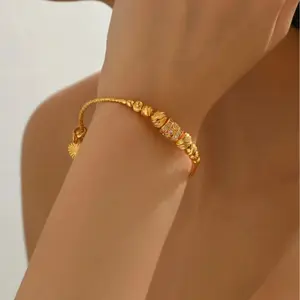 Fashion gold plated women's bracelet, bead decoration, adjustable pull and slide bracelet