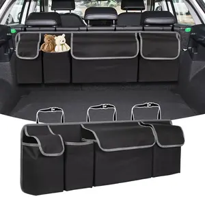 Oxford fabric multi-functional car trunk storage box with 4 large pockets and 3 adjustable straps, suitable as a rear seat storage bag for various vehicle models